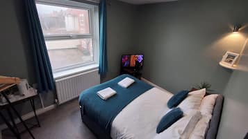 2 habitaciones, tabla de planchar con plancha, wifi y ropa de cama