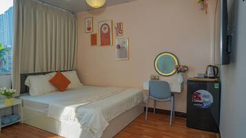 Desk, blackout curtains, soundproofing, iron/ironing board