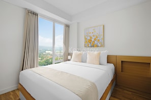 Apartemen, 2 kamar tidur, pemandangan kota | Ruang kerja ramah laptop, setrika/meja setrika, dan Wi-Fi gratis