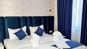 Ropa de cama de alta calidad y minibar