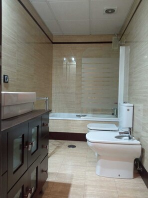 Hair dryer, bidet, towels, soap