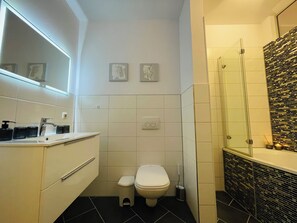 Hair dryer, towels, toilet paper