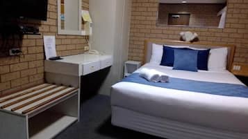Desk, laptop workspace, blackout curtains, iron/ironing board