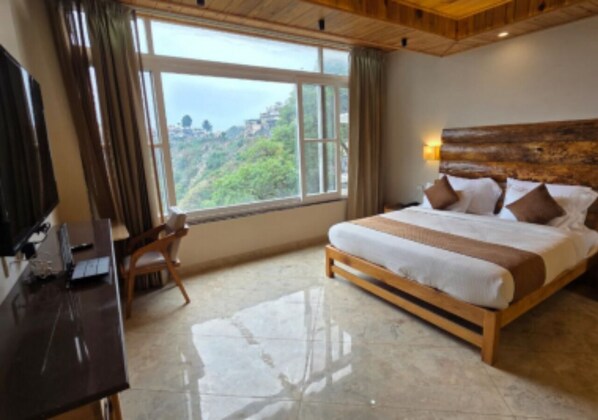 Chambre exécutive, vue sur la vallée | Fer et planche à repasser, literie fournie