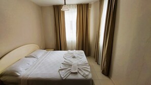 2 chambres, fer et planche à repasser, lit parapluie, Wi-Fi gratuit