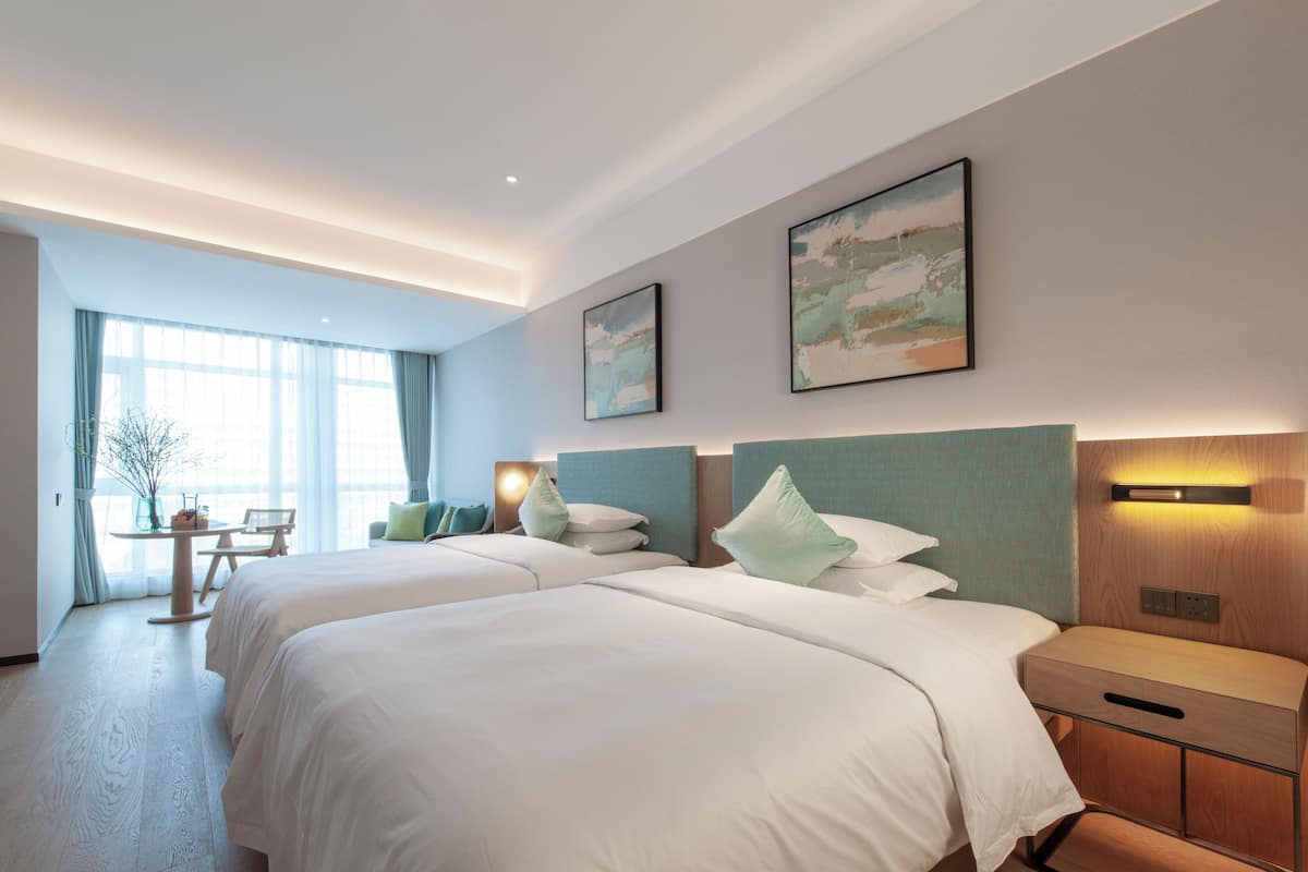 Down duvets, free minibar, blackout curtains, iron/ironing board