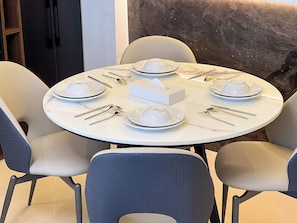 Family Apartment, Balcony, City View | In-room dining