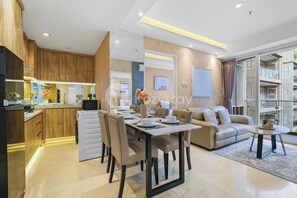 Apartment, 2 Bedrooms, City View | Living area | 55-inch Smart TV with cable channels, Netflix, streaming services - Laeta by Kozystay - Paskal (Bandung)