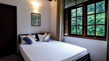 Basic Double Room, Garden View | In-room safe, blackout drapes, soundproofing, free WiFi