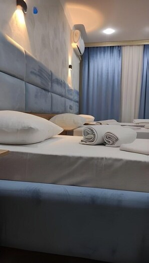 Standard Triple Room, City View | Iron/ironing board - Sharq Hotel (Urgench)