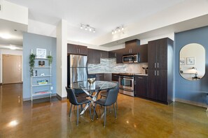 Fridge, microwave, oven, stovetop - Sleek Suite w View | 1BR, AC near BMO & Stampede (Calgary)