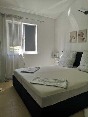 2 camere, culla da viaggio, Wi-Fi gratuito, lenzuola