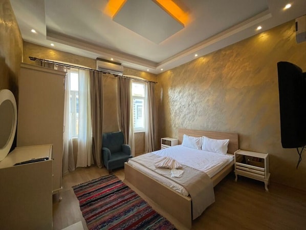 Apartment | Laptop workspace, blackout drapes, soundproofing, iron/ironing board