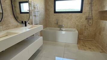 Shower, towels, soap, toilet paper