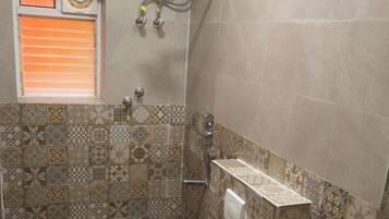 Shower, free toiletries, towels, soap