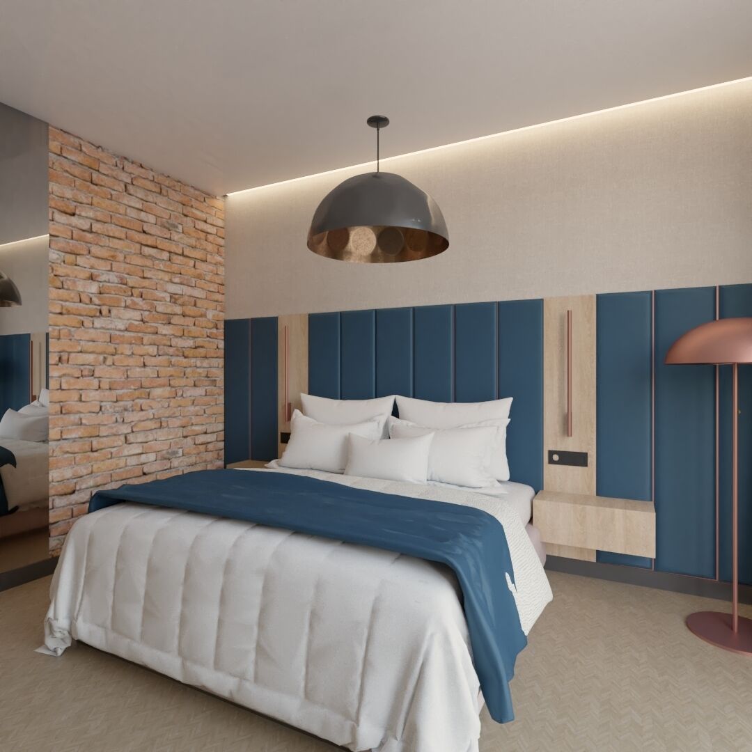 A modern bedroom with a brick accent wall, a large bed with white bedding, and a pendant light above.