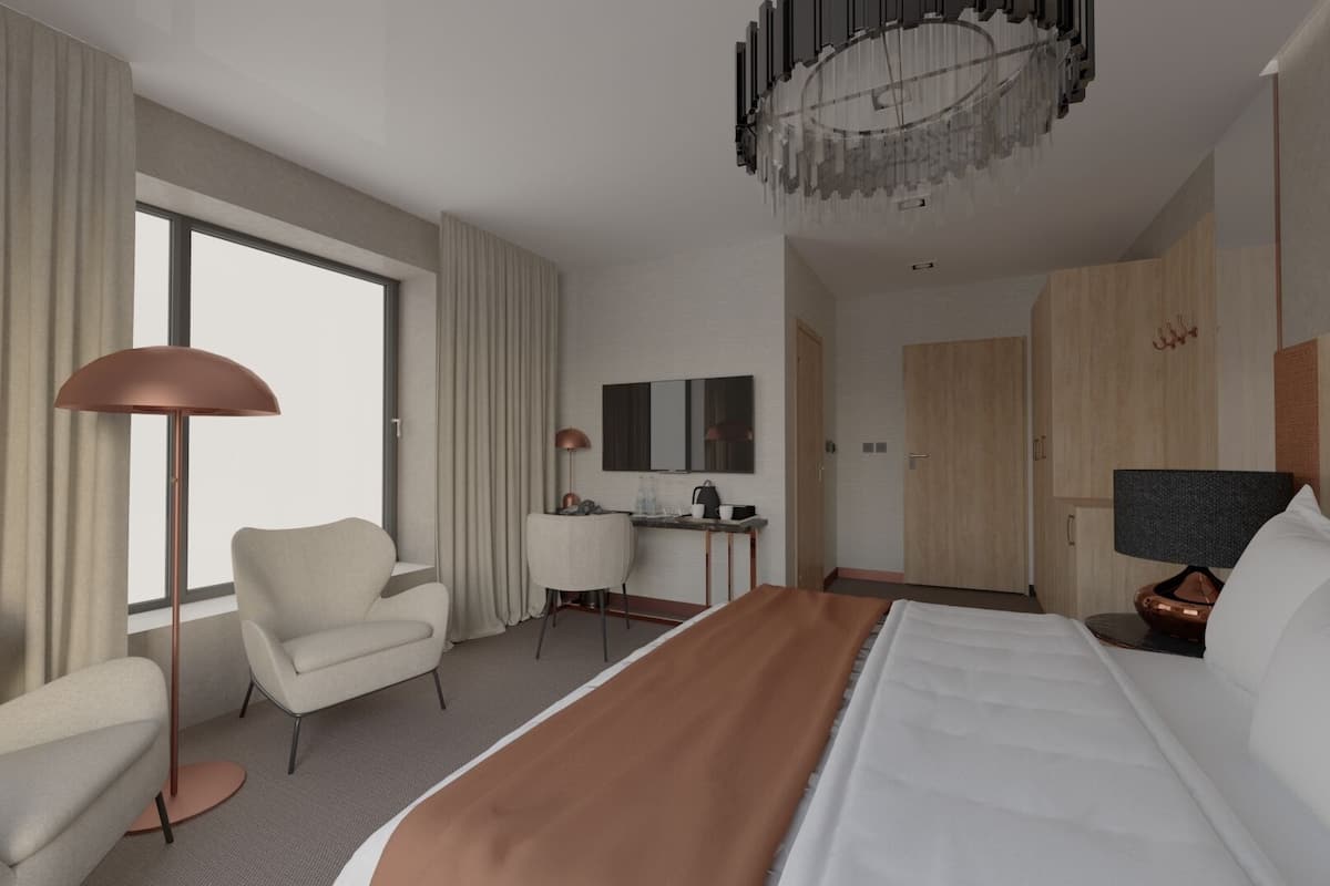 Een moderne hotelkamer met een groot bed, een bureau, een stoel en een raam.