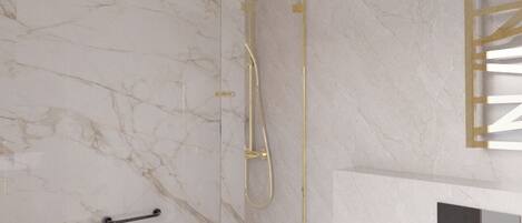 A modern bathroom with a marble wall, a white bathtub, and a gold shower system.