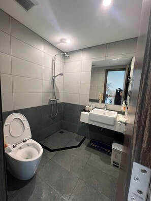 Shower, hair dryer, towels, toilet paper - The Beverly 1 - 2 bedrooms by AQHomes - Vinhomes Grand Park (Ho Chi Minh City)