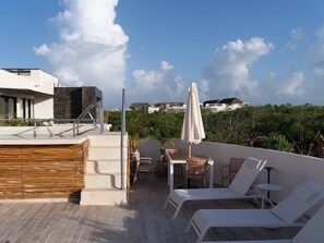 Property grounds - Discover a peaceful jungle penthouse featuring 2 bedrooms, 3 baths, and a rooftop with tree-top views. Blending clean design and natural textures, this modern escape sits just minutes from the beach in Tulum - perfect for relaxing or adventuring. (Tulum)