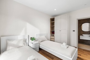 Family Apartment, 2 Bedrooms, Non Smoking, Balcony | In-room safe, soundproofing, iron/ironing board, free cribs/infant beds