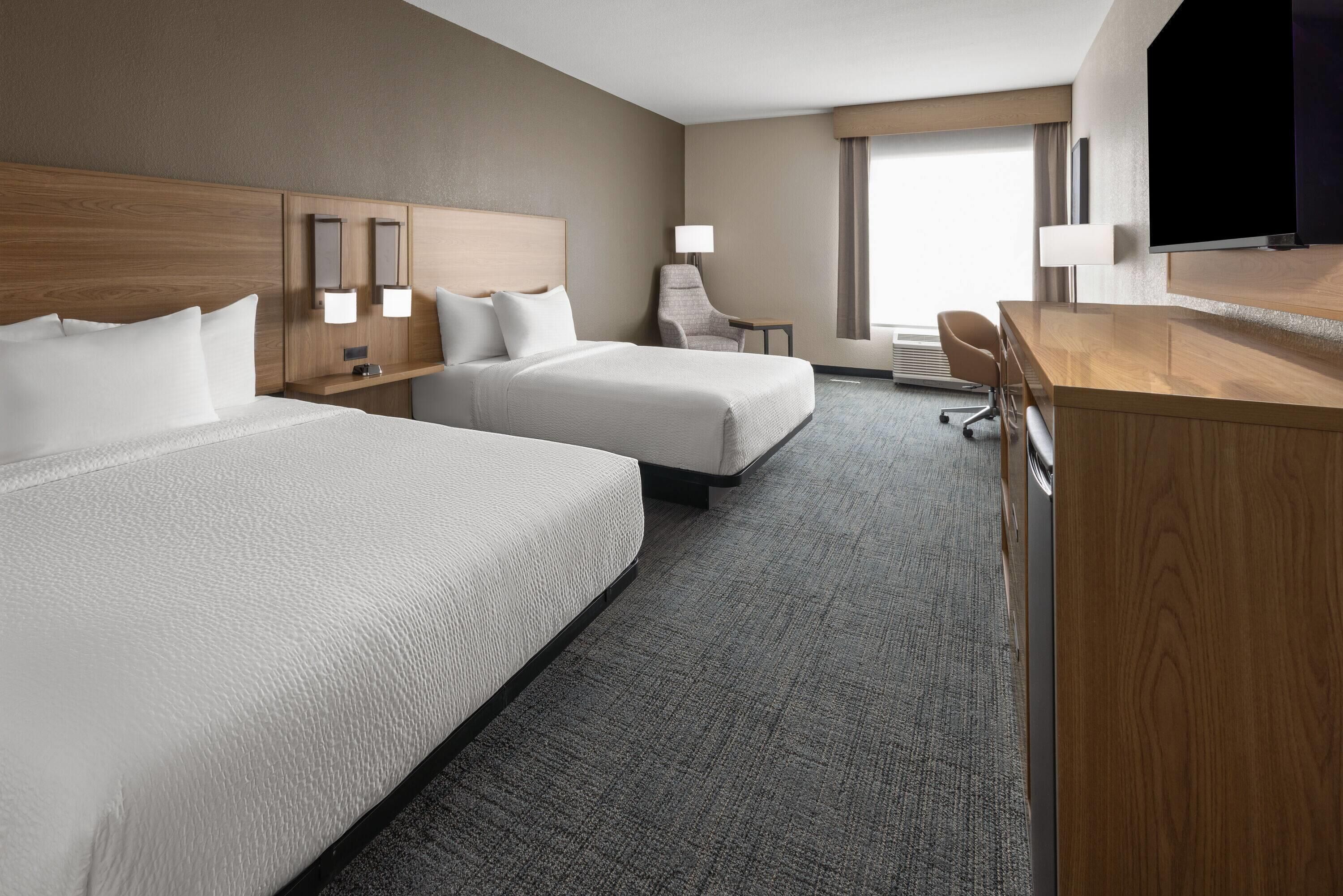 Desk, laptop workspace, blackout drapes, iron/ironing board