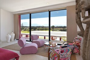 Luxury Suite, Pool View | Select Comfort beds, minibar, in-room safe, soundproofing