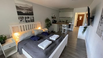 1 quarto, cofres nos quartos, ferros/tábuas de passar roupa