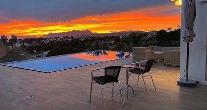 Luxury villa with stunning sea views, walking distance from El Portet beach.