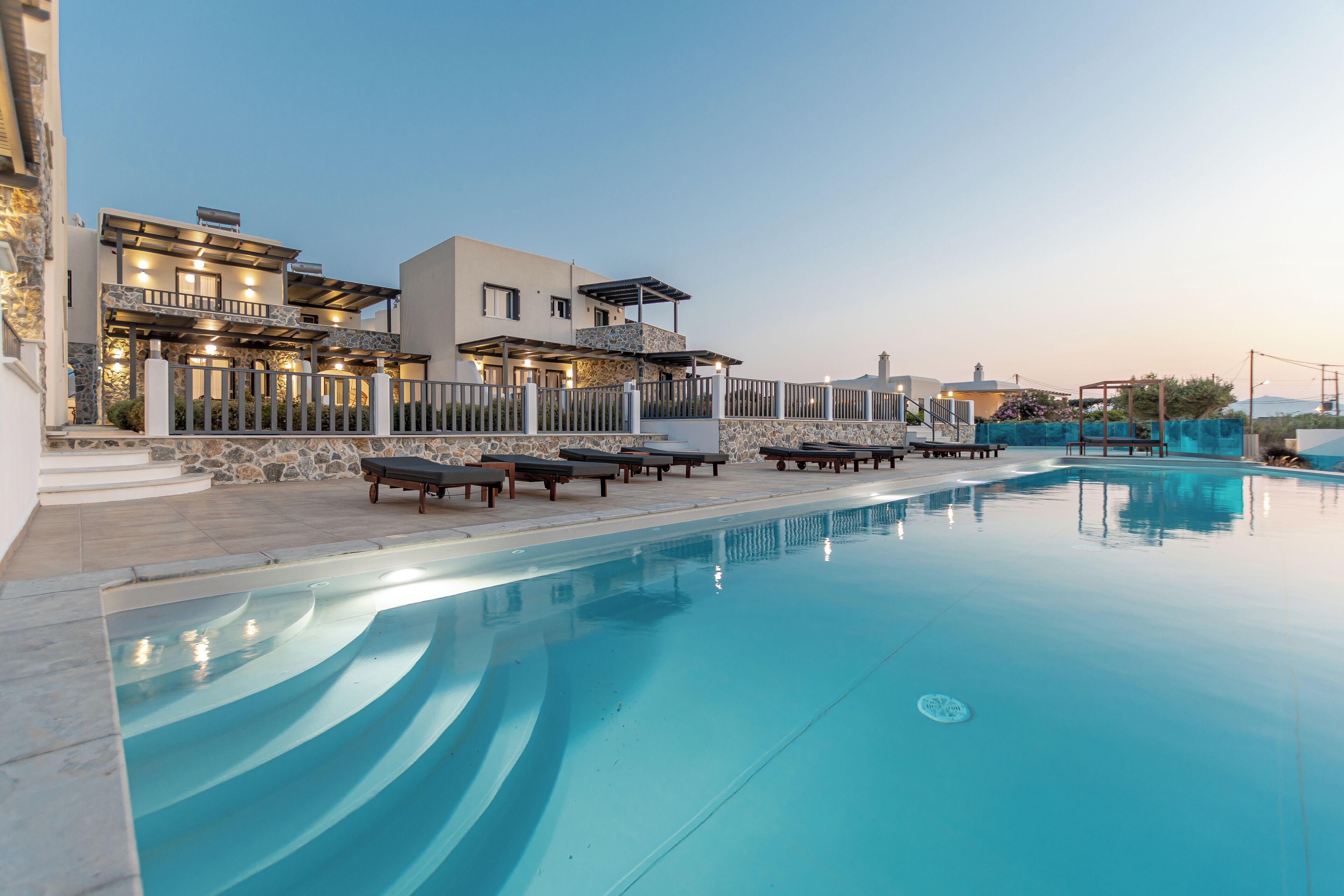Seasonal outdoor pool, pool umbrellas, pool loungers
