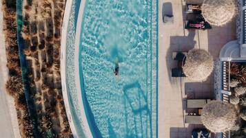 Seasonal outdoor pool, pool umbrellas, pool loungers