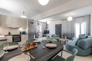 Grand-Suite, 2 Schlafzimmer, Meerblick | Wohnbereich