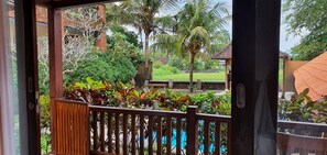 Habitación Deluxe, vistas a la piscina | Terraza o patio