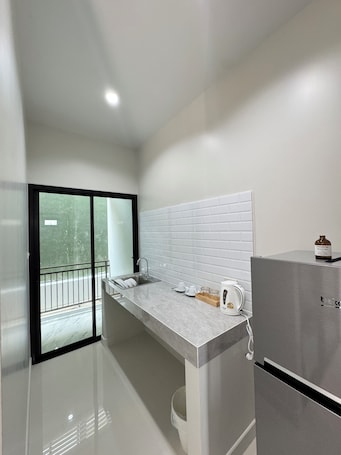 Standard Room, Patio, Lagoon View | Private kitchen