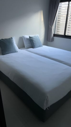 Standard Room, 2 Single Beds, Patio, Lagoon View | Free WiFi