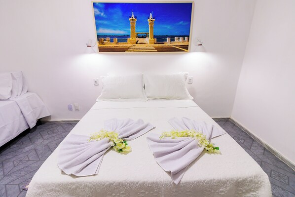 Deluxe Triple Room | Iron/ironing board, free WiFi, bed sheets