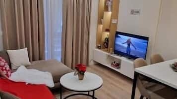 50-inch flat-screen TV with satellite channels