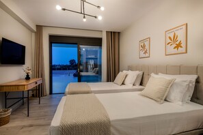 2 chambres, coffres-forts dans les chambres, fer et planche à repasser