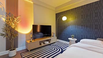 1 bedroom, desk, iron/ironing board, travel crib