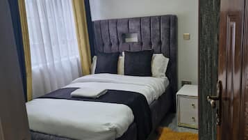 2 bedrooms, iron/ironing board, WiFi, bed sheets