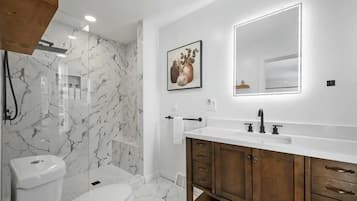 Hair dryer, towels, soap, toilet paper
