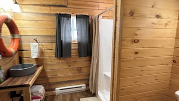Shower, hair dryer, towels, toilet paper