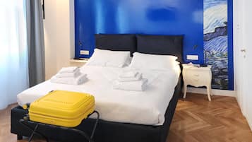 Habitación doble Deluxe, vista a la ciudad (Notte) | Edredón y artículos del minibar gratis