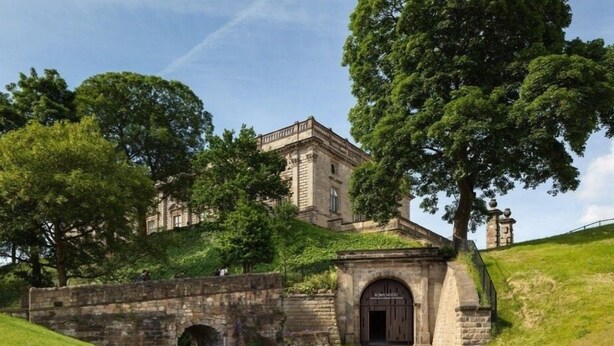 A historic building with a stone bridge, arched entrance, and lush greenery. - Premium Serviced Accommodation Nottingham - 4 Bedrooms - All Ensuite - Sleeps 7 (Nottingham)