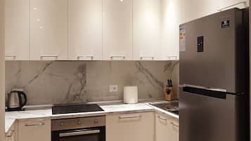 Apartment | Private kitchen | Fridge, oven, stovetop, dishwasher