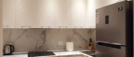 Apartment | Private kitchen | Fridge, oven, stovetop, dishwasher