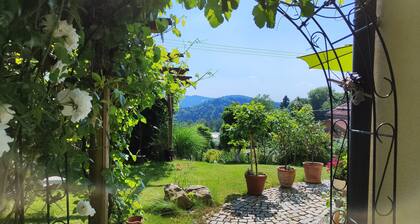 Pure romance & tranquillity - time out on the edge of the forest with mountain views and a tiled stove