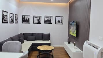 Apartment | Living area | 32-inch Smart TV with satellite channels, Netflix, streaming services