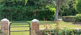 Lovely detached house close to village on enclosed land planted with trees.