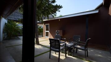 Quarto standard, vista para o jardim | Vista do quarto